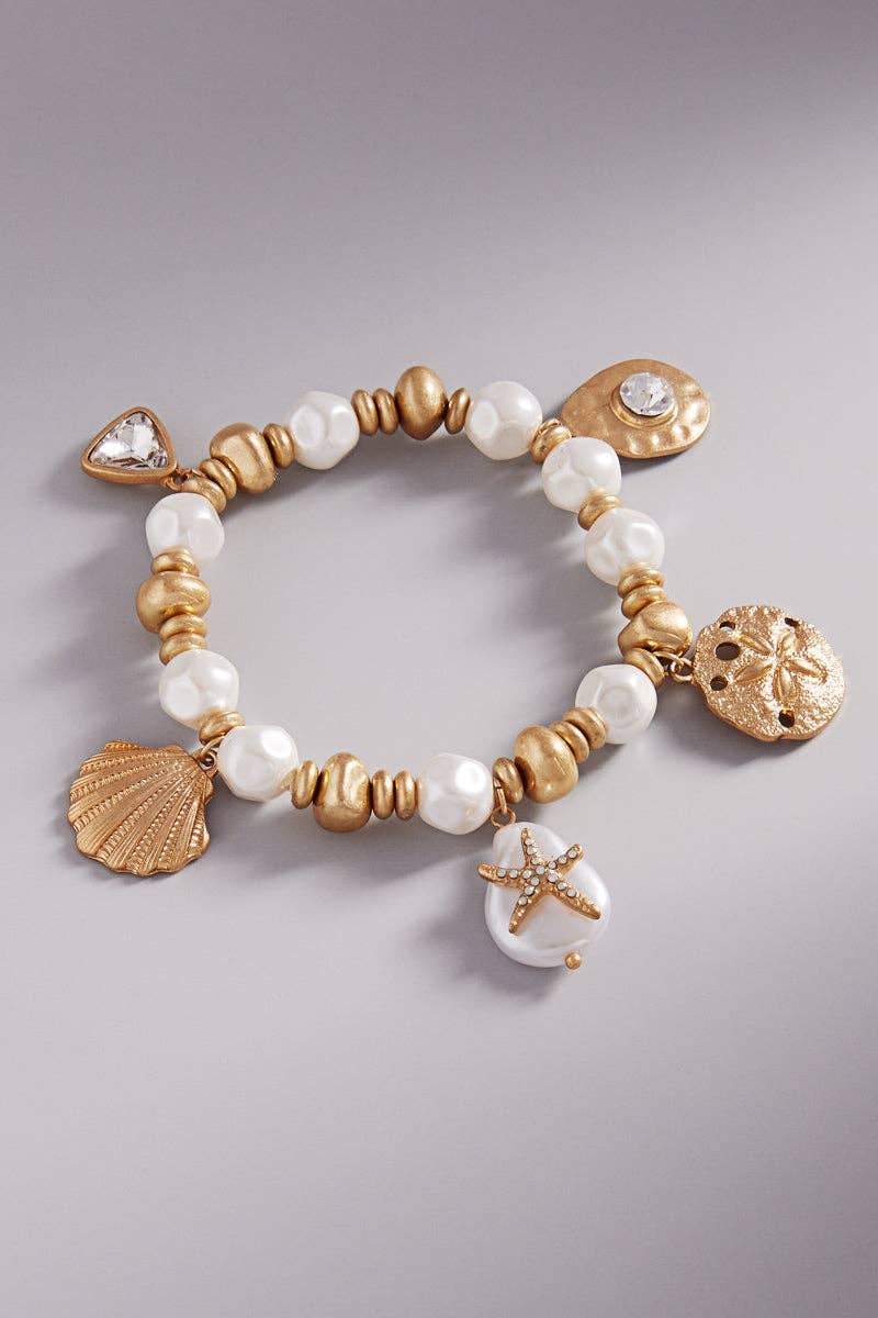 Designature New York - Sealife Shaped Pearl With Charm Stretch Bracelet: VS / ONE
