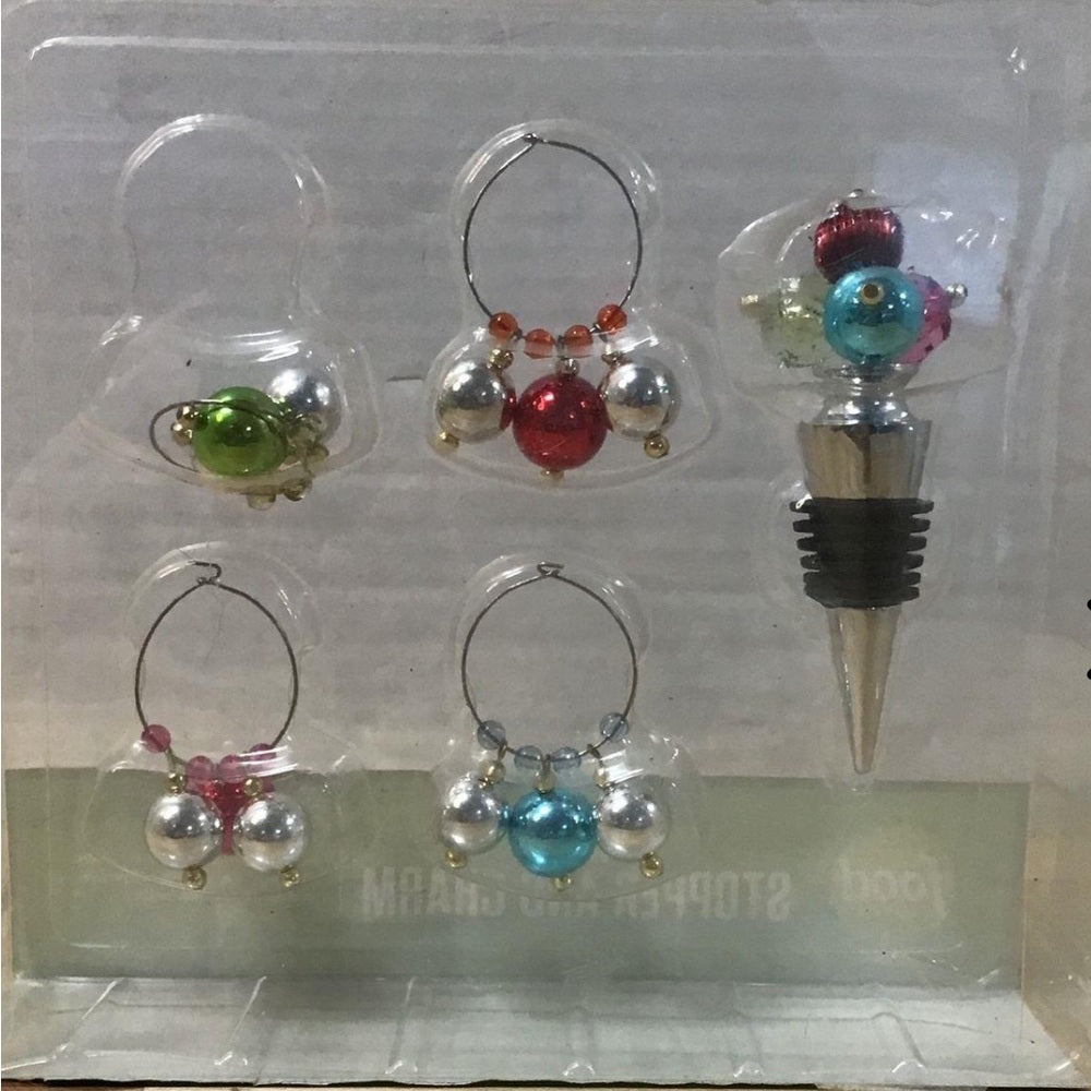 Wine stopper and charms in their original packaging